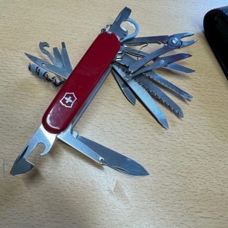 4449 a Victorinox Swisschamp in Leather Pouch