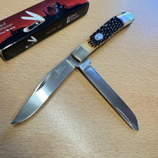 Jim Bowie Trapper Twin Blade pocket knife.